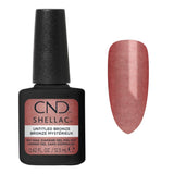 Nuancier bronze rosé cuivré scintillant accompagné du flacon CND Shellac Untitled Bronze 12,5 ml
